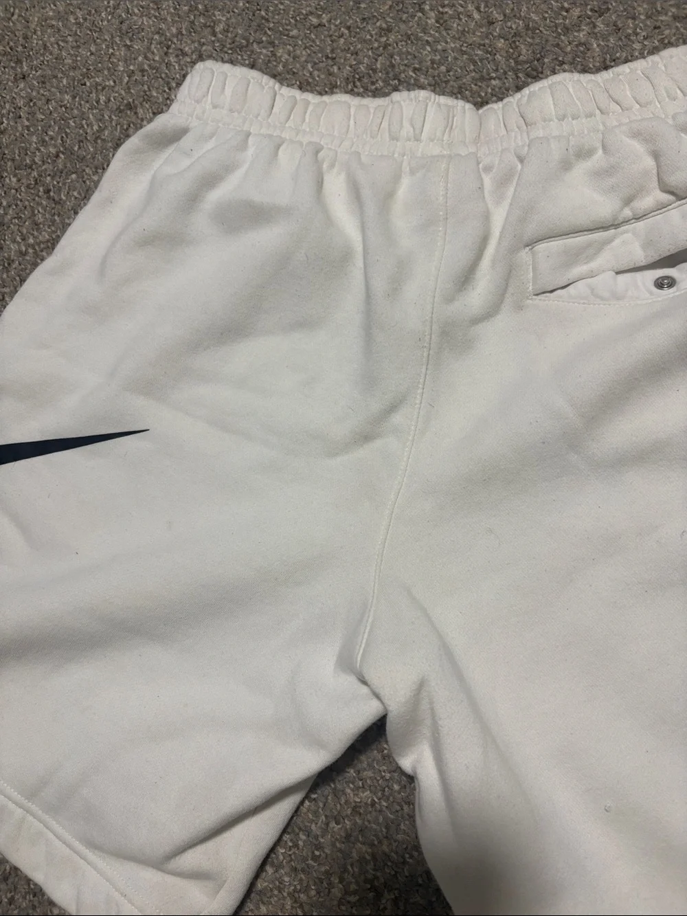 Nike White Athletic Shorts with Black Swoosh